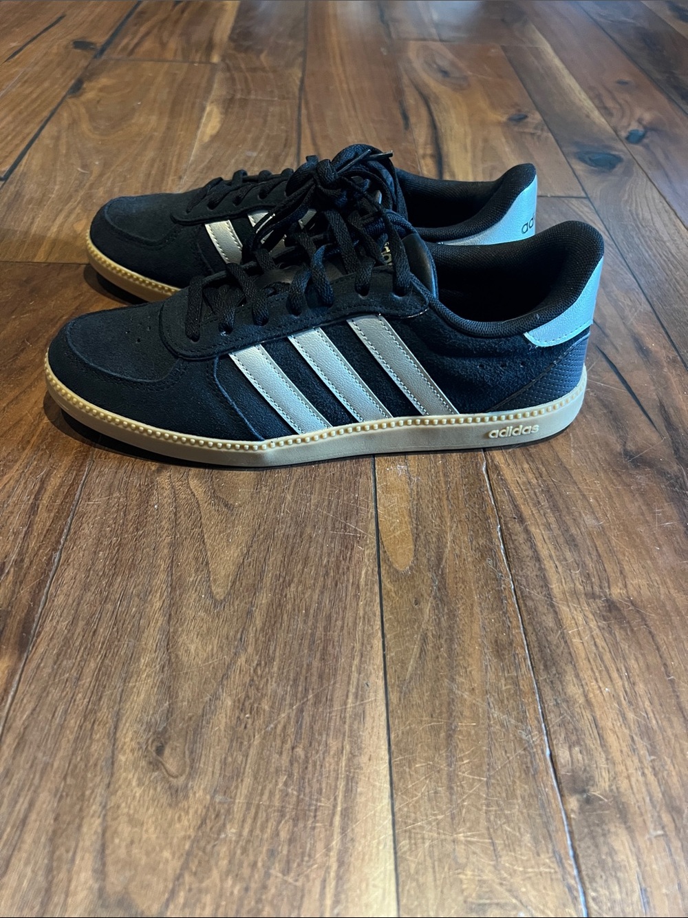 adidas Women's Black Sneakers with Gold Three-Stripes